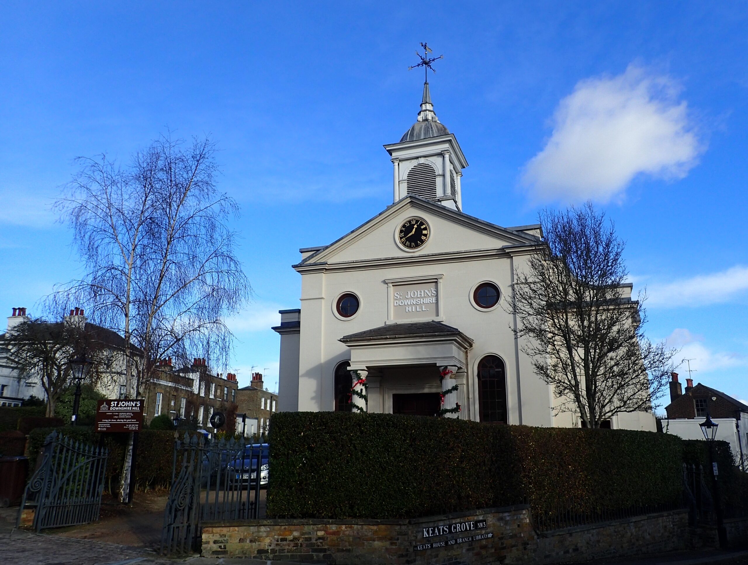 Church frontage set against a blue sky